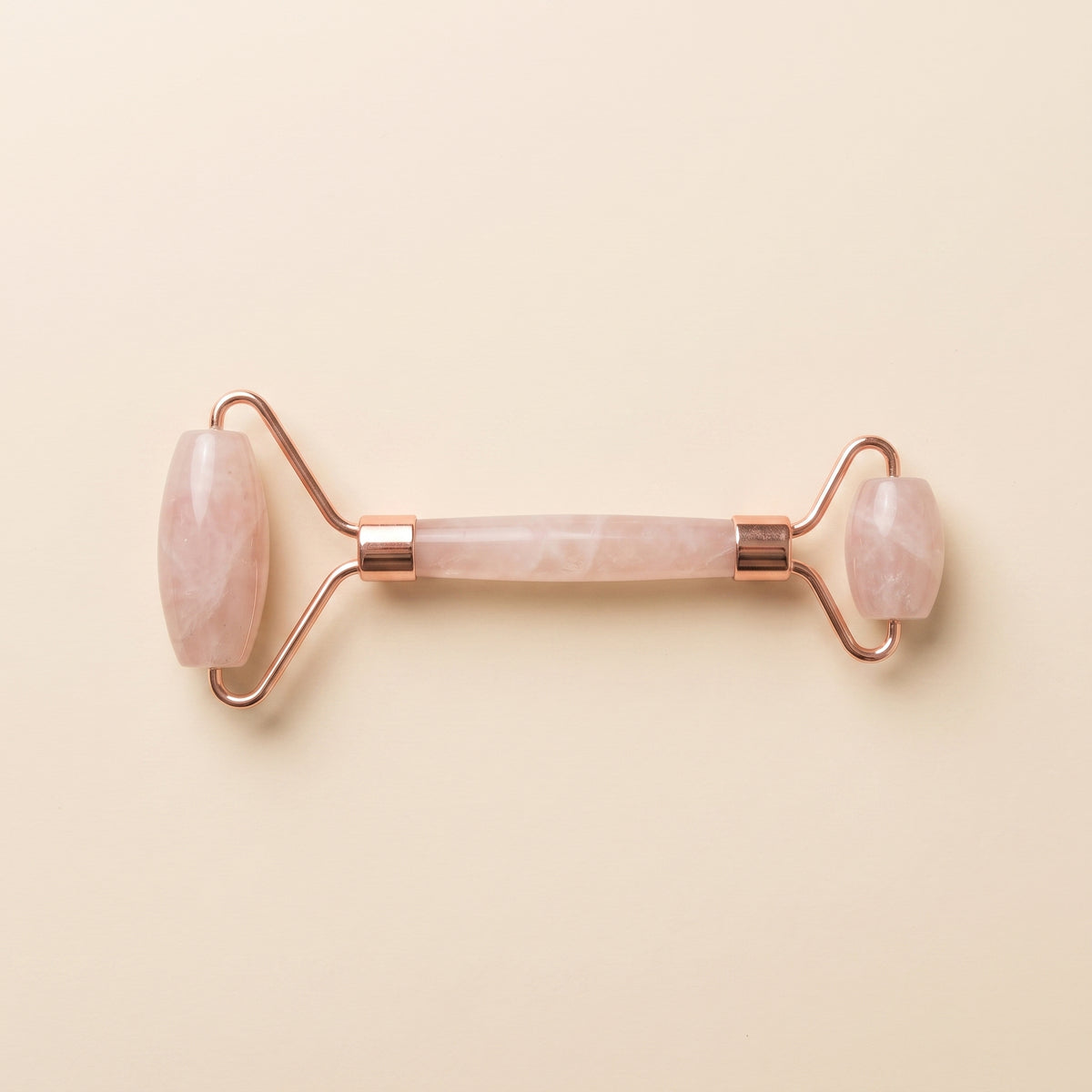 Le Roller — Roller de massage en quartz rose